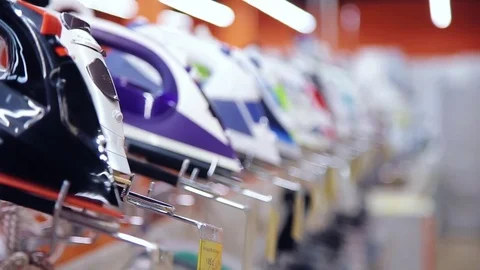 range of electric irons in store | Stock Video | Pond5