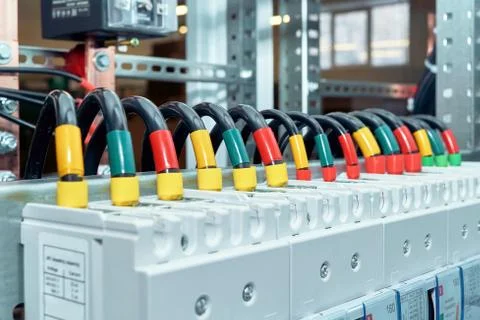 Range of electrical wires or cables are connected to the power circuit breake Stock Photos