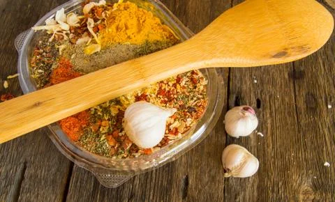 The range of Oriental spices with spicy chilli, curry and a mixture of other  Stock Photos