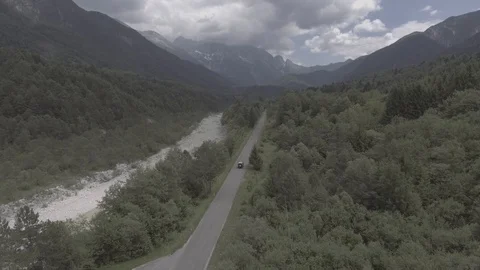 Range rover defender driving near mountain, aerial drone view Video stock 100605065