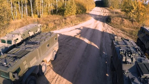 Range of russian utility off-road vehicle tracks riding on the road Video stock 95917408