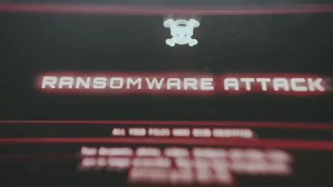 Ransomware attack warning screen featuring a skull icon Stock Footage 335461427