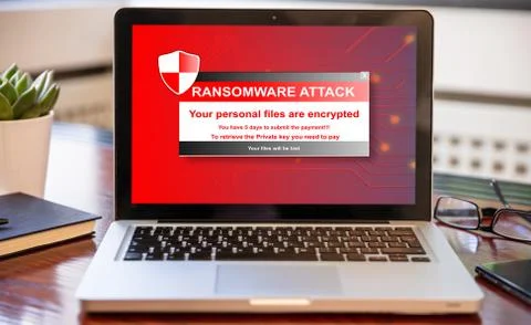 Ransomware text on computer screen, Cyber attack concept. Office business woo Foto stock