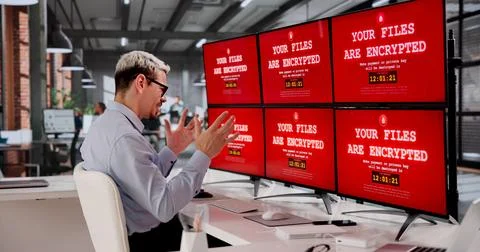 Ransomware Warning. Encrypted Data Displayed On Monitor In Cybersecurity Cris Stock Photos