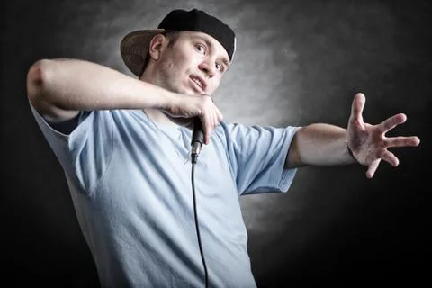 Rap singer man with microphone cool hand gesture Stock Photos