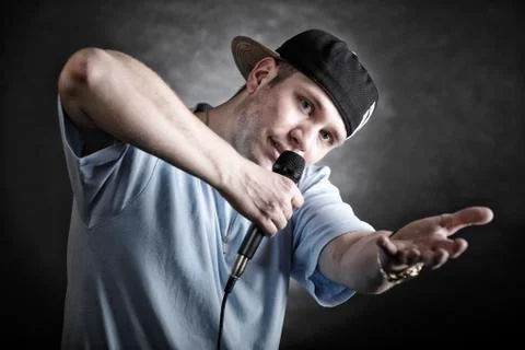Rap singer man with microphone cool hand gesture Foto stock
