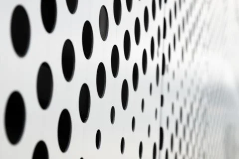 Rapid black big dot pattern on white background, round holes texture on Stock Photos