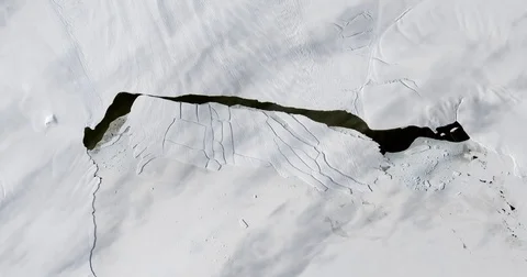 Rapid breakup of iceberg B-44 off Pine Island Glacier, Antarctica Stock Footage 81879987