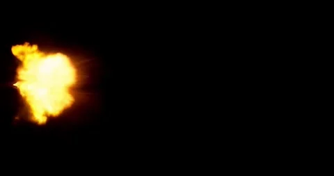 Rapid burst of multiple gun muzzle explosions isolated on black background. Stock Footage 327902853