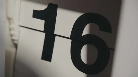Rapid Change of Days number on Retro Mechanical Flip Clock Calendar Stock Footage 330925027