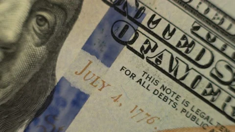A rapid close up stop motion montage of a US $100 bill Stock Footage 173172888