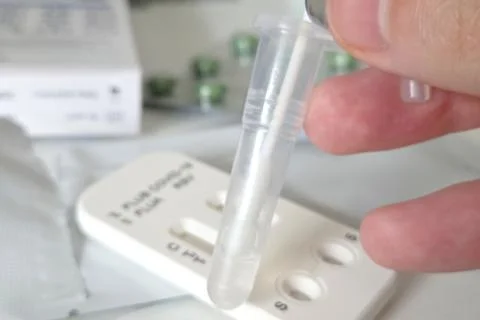 Rapid COVID-19 Antigen Test Kit with Sample Dropper for Quick Home Testing Stock Photos
