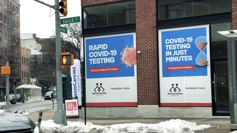 Rapid Covid-19 testing sign on building West Village Downtown Manhattan NYC 스톡 동영상 148344127