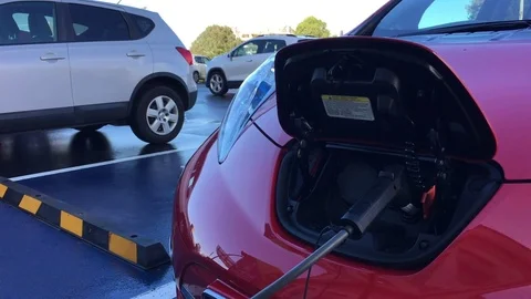 Rapid electric vehicle charging station Stock Footage