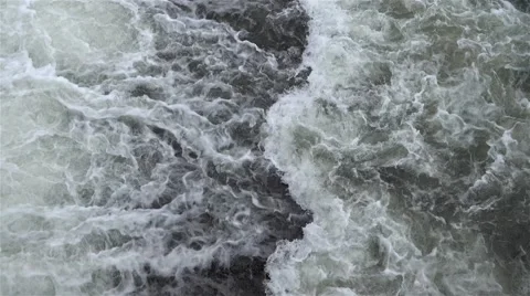 Rapid flow and waterfall of water in the river Stock Footage 63086644