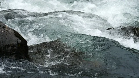 Rapid flow of crystal clear water in a mountain river 6 Stock Footage 137874331