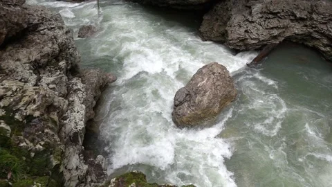 Rapid flow of a mountain river in a rocky gorge. Slow motion 240 fps Stock Footage 168178401