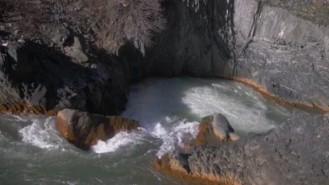 Rapid flow of a mountain river in a rocky gorge in the mountains Stock-Footage 190757865