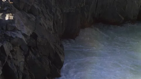 Rapid flow of a mountain river in a rocky gorge in the mountains Video stock 190765534