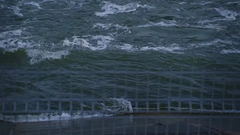 Rapid flow of river waters. Spring melt water boils and foams in the river Stock Footage 196904444