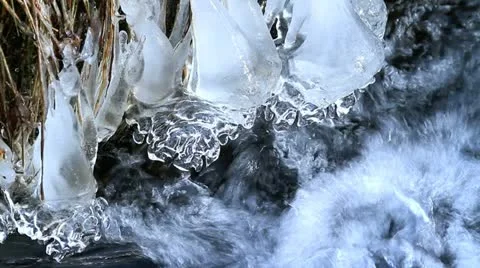 Rapid flow of water in a mountain river in winter. Stock Footage 11314136