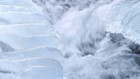 Rapid flow of water in a mountain river in winter. Stock Footage 85826596