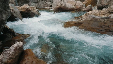 Rapid flow of water in a mountain river with rapids Stock Footage 161414630