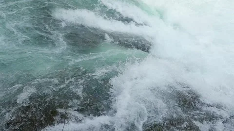 Rapid flow of water in mountain river close-up 스톡 동영상 248364539