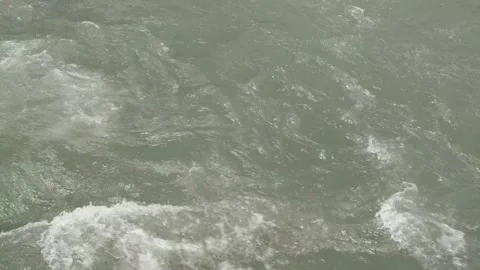 Rapid flow of water in river or stream 動画素材 313884707