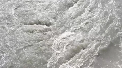 Rapid flow of water in river, top view Stock Footage 330429306