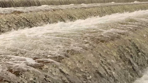 The rapid flow of water. Small waterfall Stock Footage 129523436