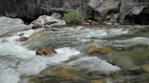 Rapid flowing water down a fresh water stream Stock-Footage 25507631