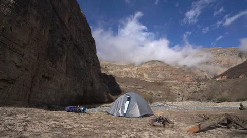 Rapid Mountain Mist Flow Behind Camp in Scenic Valley – Timelapse Video stock 318899790