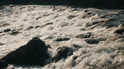 Rapid mountain river natural waterfall movement water splashing stream with Stock Footage 235437115