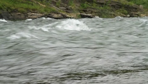 Rapid mountain stream with stones Stock Footage 8639844