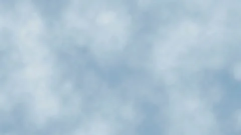 The rapid movement of blurry white clouds against a blue sky. Stock Footage 126025828