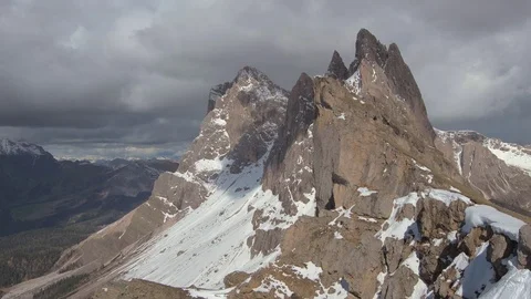 Rapid movement of clouds over the mountain Seсeda covered with snow 스톡 동영상 77703206