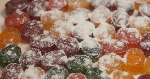 Rapid rotation of multi-colored sweets, clockwise rotation, different dragees Stock Footage 119095872