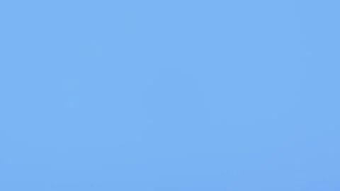 Rapid sequence of bright solid colors flashing in a seamless loop background 動画素材 329402916