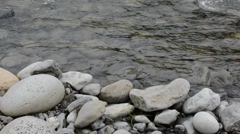Rapid shallow river and the pebble shore Stock Footage 40876097