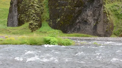Rapid shallow river running among cliffs, Fjaðrárgljúfur, south Iceland Stock Footage 40876467
