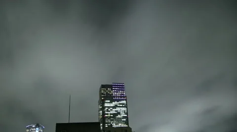 Rapid storm cloudscape covering the buildings of Tokyo. Vídeos de archivo 61805073