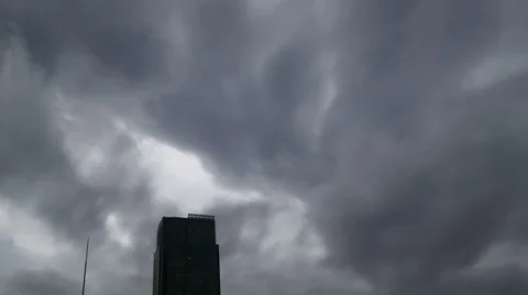 Rapid storm cloudscape over the buildings of Tokyo. Video stock 61806028