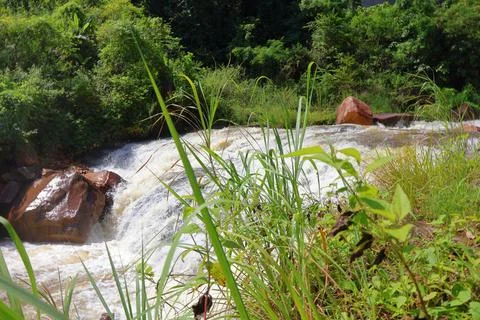 Rapid stream flowing at Chambok Waterfall in Kampong Speu Cambodia Stock Photos