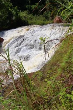 Rapid stream flowing at Chambok Waterfall in Kampong Speu Cambodia Stock Photos