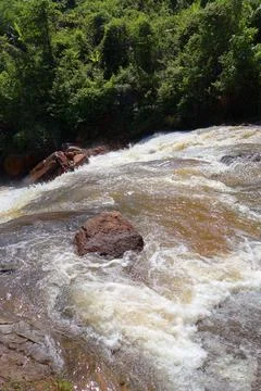 Rapid stream flowing at Chambok Waterfall in Kampong Speu Cambodia Stock Photos