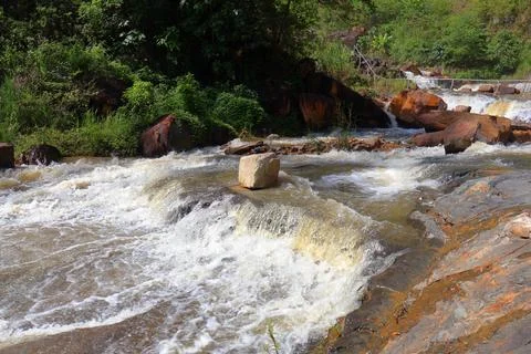 Rapid stream flowing at Chambok Waterfall in Kampong Speu Cambodia Stock Photos