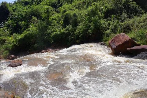 Rapid stream flowing at Chambok Waterfall in Kampong Speu Cambodia Stock Photos