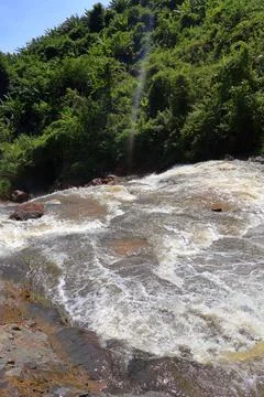 Rapid stream flowing at Chambok Waterfall in Kampong Speu Cambodia Stock Photos