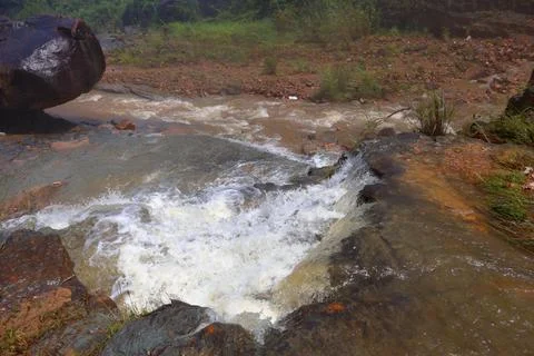 Rapid stream flowing at Chambok Waterfall in Kampong Speu Cambodia Stock Photos
